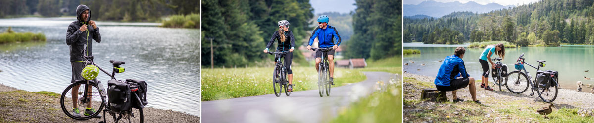 Mann und Frau mit einem Trekkingrad über Stock und Stein