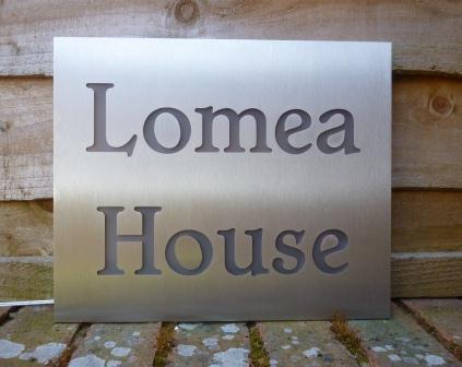Stainless Steel House Sign, stainless steel house name, steel house sign, address sign in stainless steel, metal house name, metal house sign, house sign with LEDs, LED House sign in the daytime