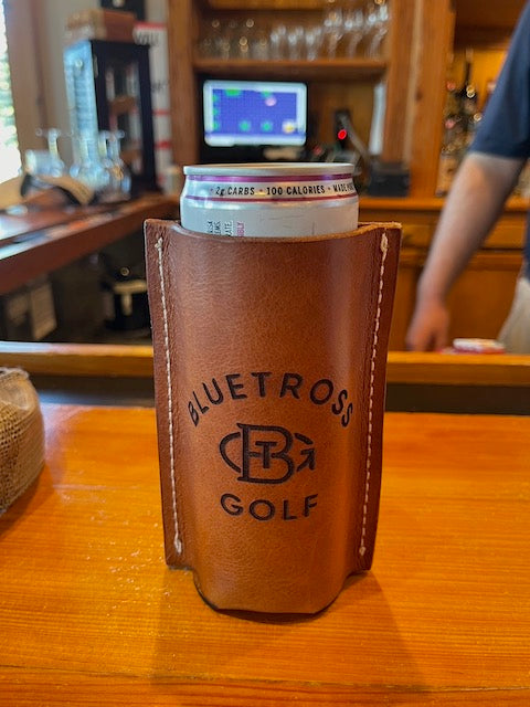 Bluetross Golf Koozie sitting on Bar