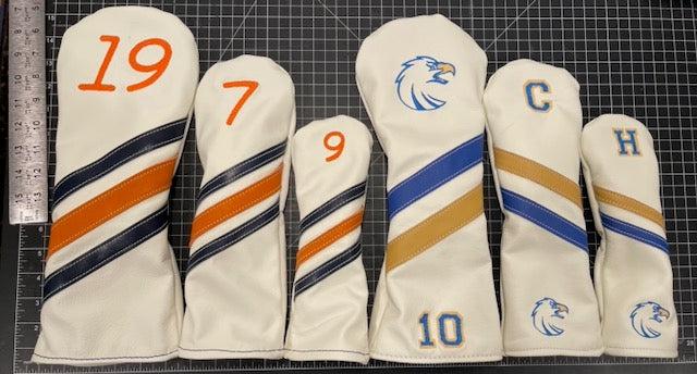 Group of White Headcovers with Logos and numbers