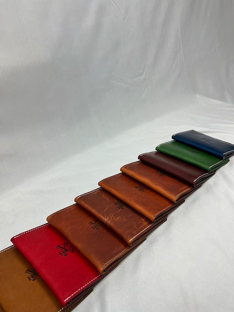 Line of Yeaman's Hall scorecard Holders mulitiple colors and leather types