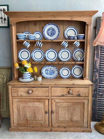 Old pine dresser with blue and white china at Source for the Goose, South Molton, Devon, UK