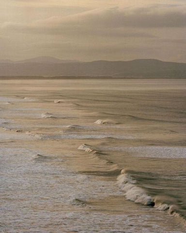 the ocean waves at sunset