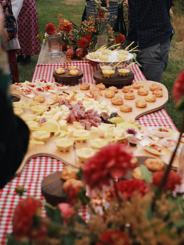 cheese and charcuterie set out on a table