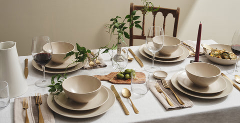 A fully set table with Dune ceramics