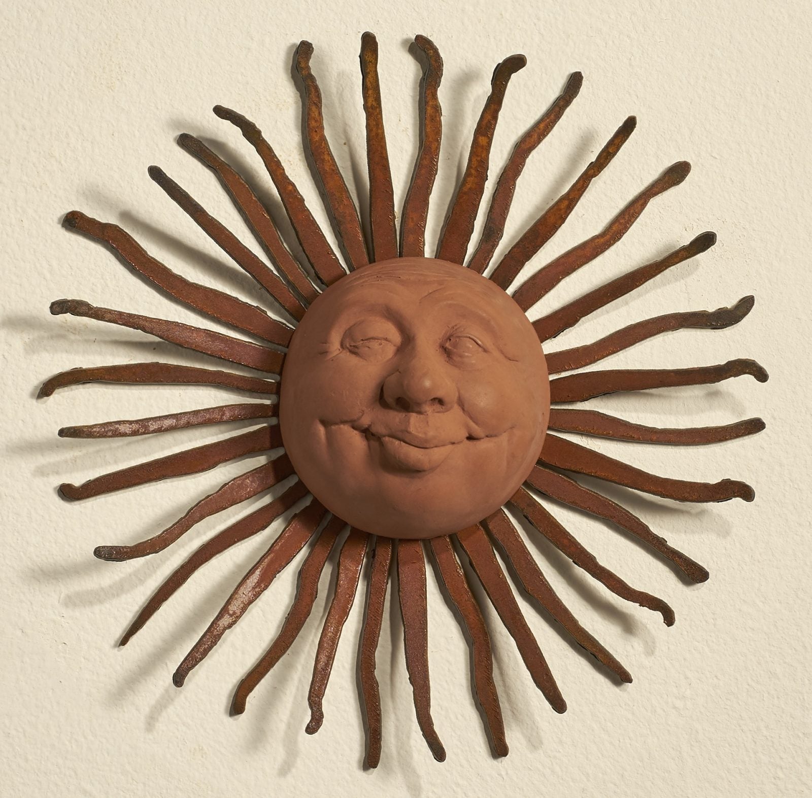 metal sun face