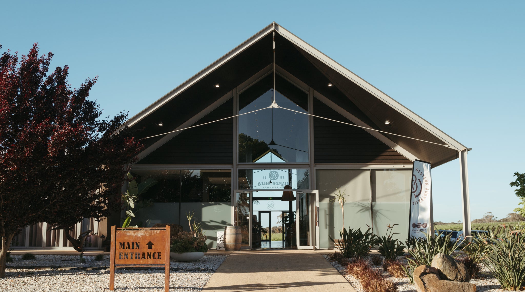 The entrance to Wills Domain Cellar Door, doorway to an extraordinary Margarets River wine tasting experience featuring paired snack platters for foodies.