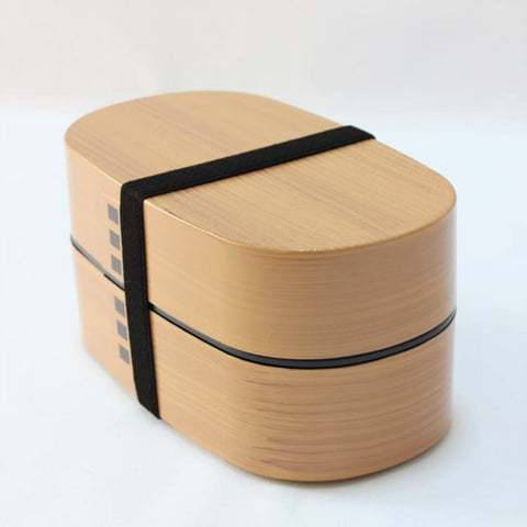 light brown wappa shaped bento box with lunch band