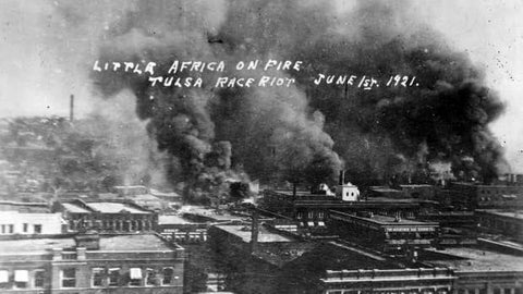 Black Wall Street on fire vintage picture includes the words Little Africa on Fire