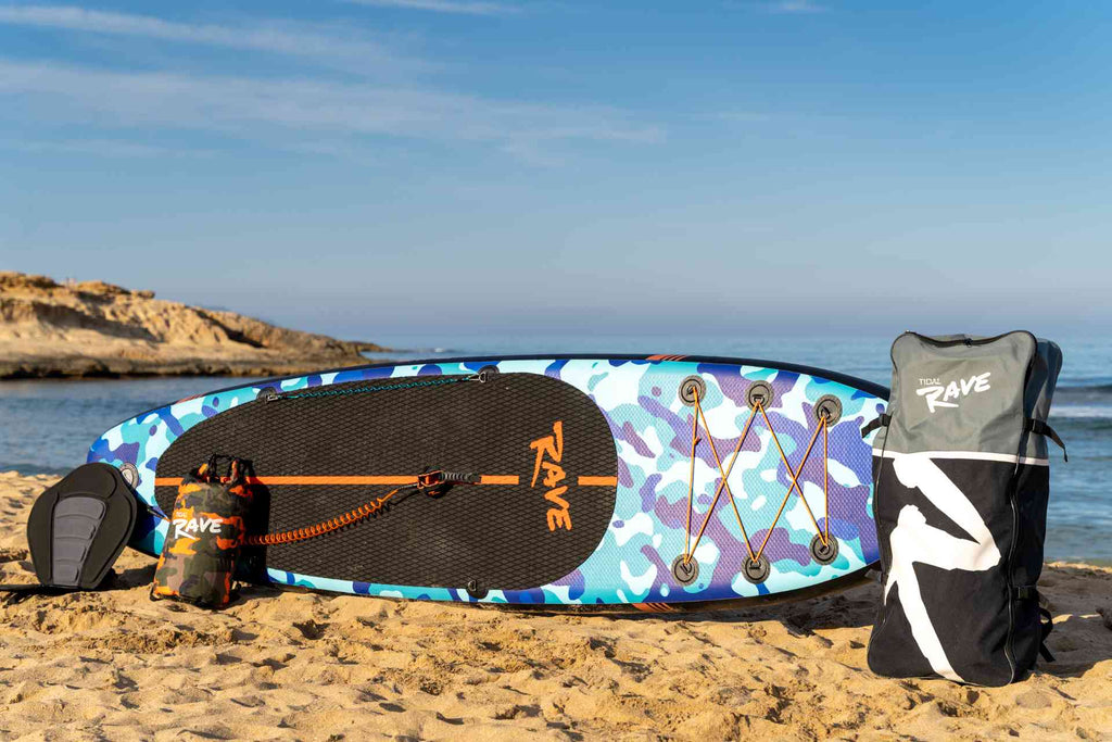 fully inflated paddle board on the beach