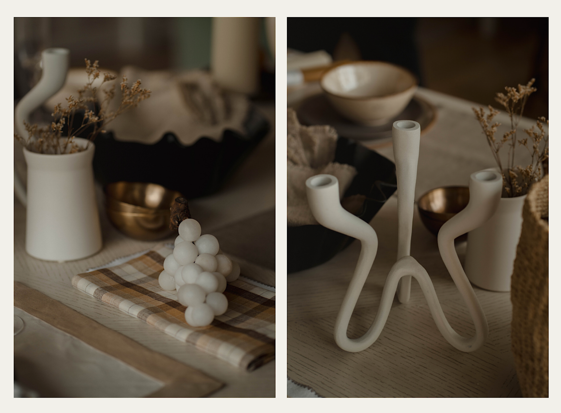 Two side-by-side images of a styled dining table. One features an alabaster grape sculpture placed atop brown, block check linen napkins. The next displays a tapered candle holder in a white finish with a curved architectural design.