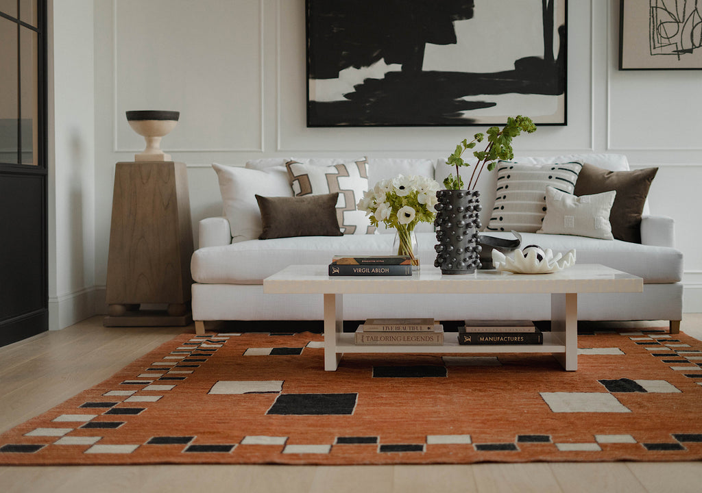 A styled living room with a focus on The Valentine Rug.