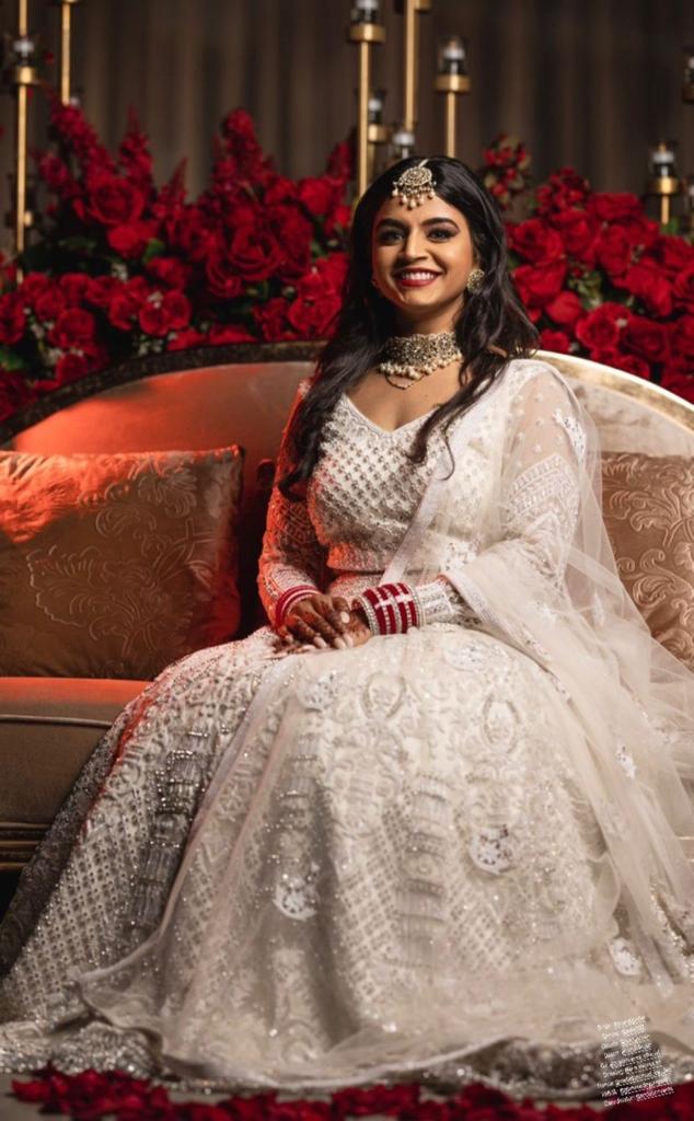 Our clients Chandni & Paras from Chicago wearing fully custom made Coordinated Indian Bridal Lehenga and Groom Sherwani.