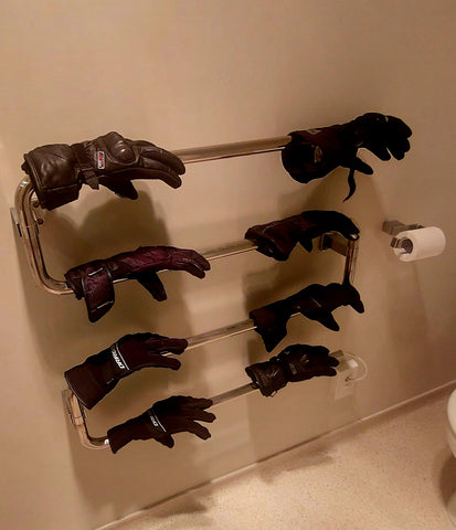 gloves on a towel warmer