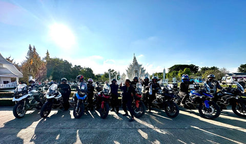 white temple with motorcycles in front