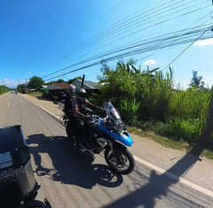 motorcycle rider and pillion