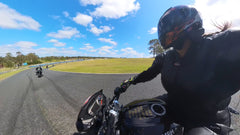 Motorcycle riders on track