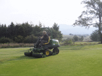 Thatchaway of green prior to topdress