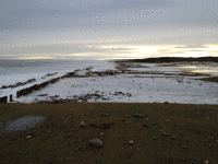 Golspie 5th Green at bottom of the bank, 6th tee and 7th all submerged