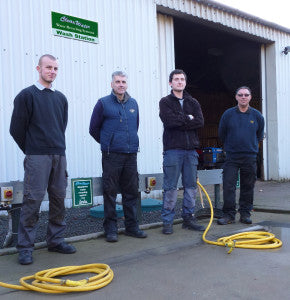 The greenkeeping team at Holme Hall on the ClearWater system washpad and all you see are hoses and turret tops!