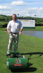 Jim McKenzie Director of Golf Celtic Manor with 1950s Ransomes Auto Certes.JPG