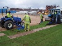 Photo 7 - Laying of imported turf.jpg