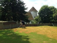 Picture 9. Wes at work giving the green a heavy dressing