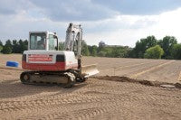 Rowley Lane Sports Association pitches under construction in Barnet showing Speedcut finishing surface over lateral drainage into main drain.JPG