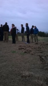 Inspecting the hog damage