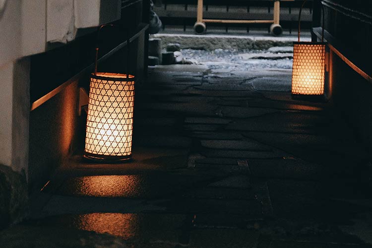 Latticed floor lamps in an Asian street