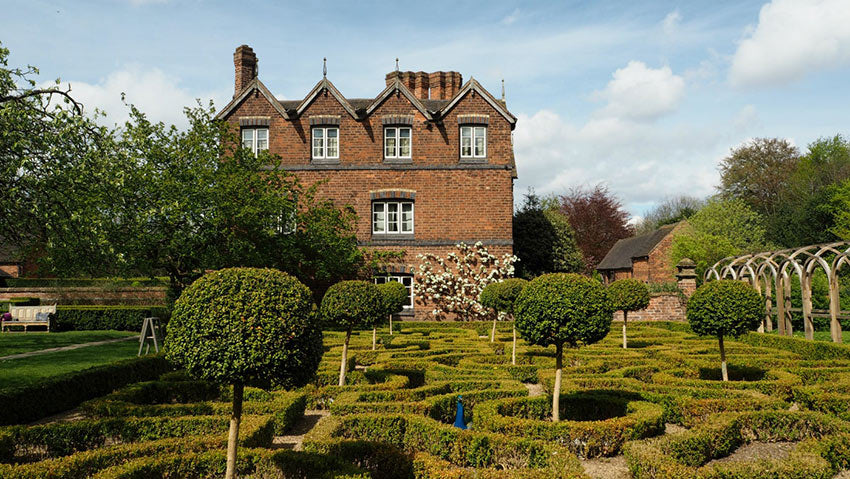 Stroll through the unique garden of Moseley Old Hall. 
