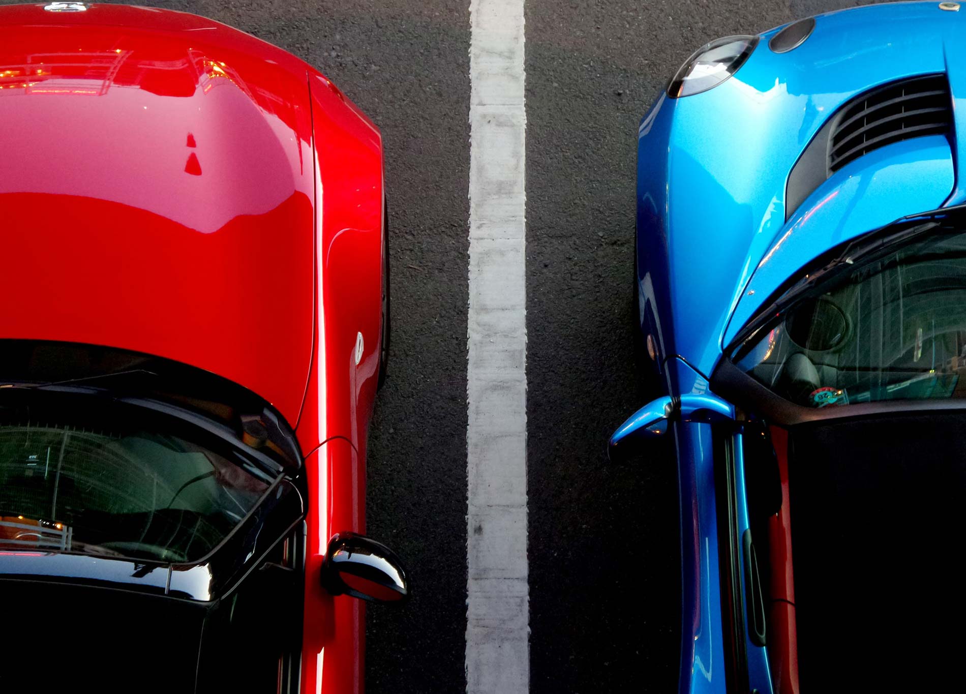 Dual power, represented by two cars in different colours