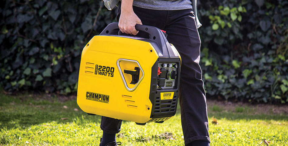 A man carrying Northern Generator’s Champion 2200 Watt Inverter Generator