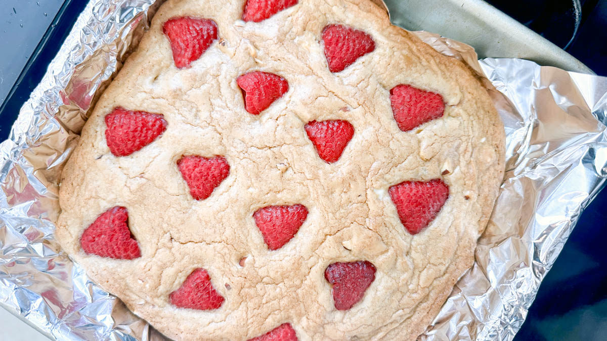 Raspberry blondies fresh out of the oven before they've been cut up.