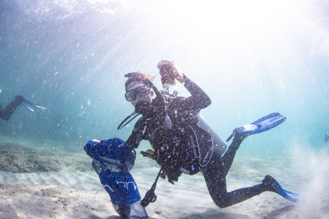 Diver collecting debris at the Pier Clean-up 2022