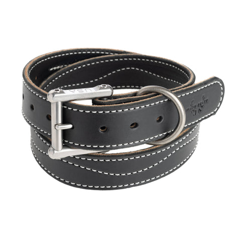 Close-up view of a premium Mack leather belt with a sturdy metal buckle, exemplifying the quality and craftsmanship that professionals prefer