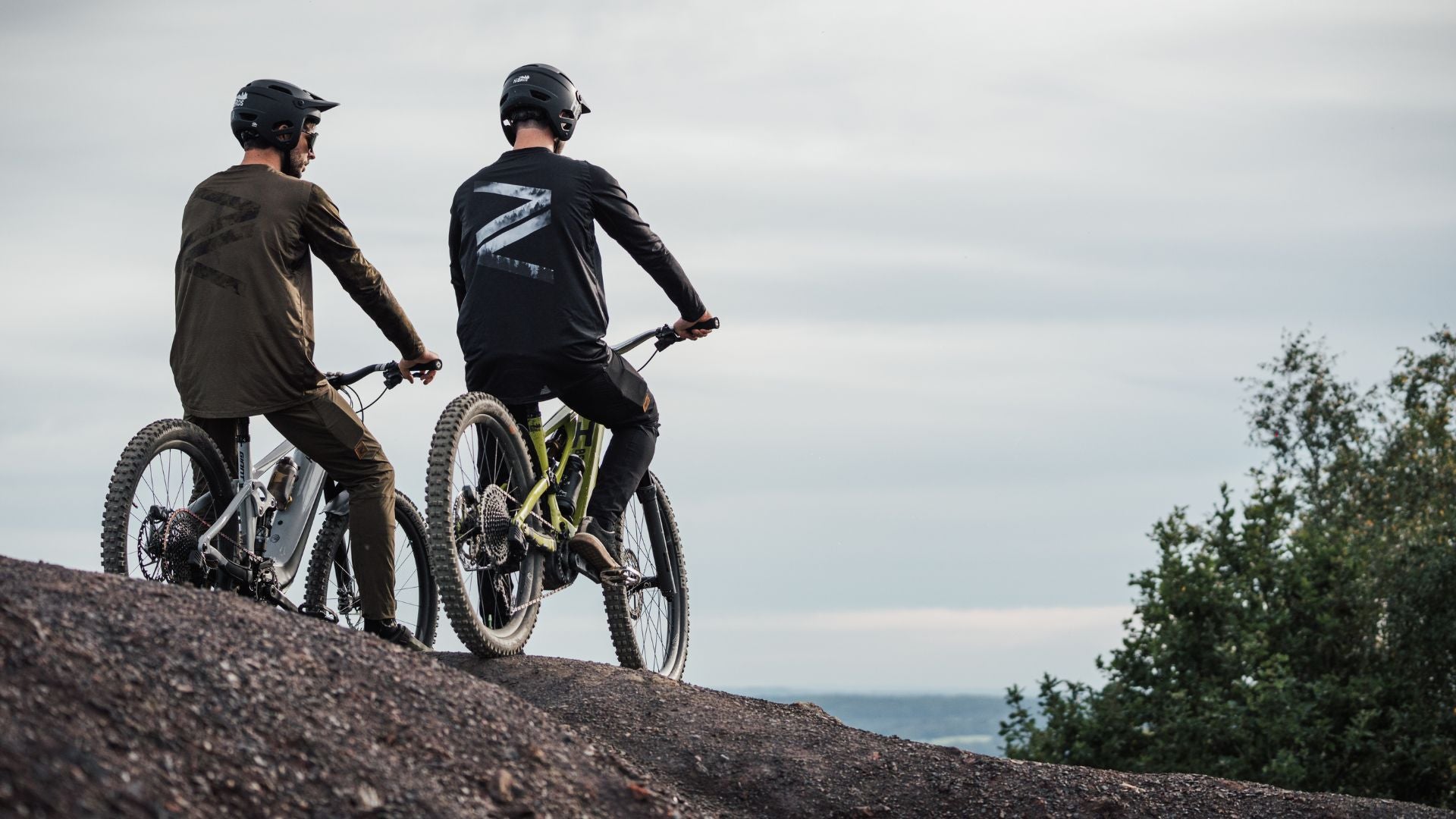 Mountain bikers looking at the trail ahead of them