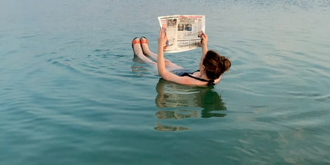 person floating in Dead Sea for psoriasis
