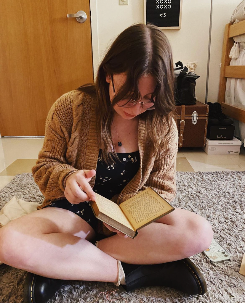 Girl reading an antique book from Alison Rose Vintage