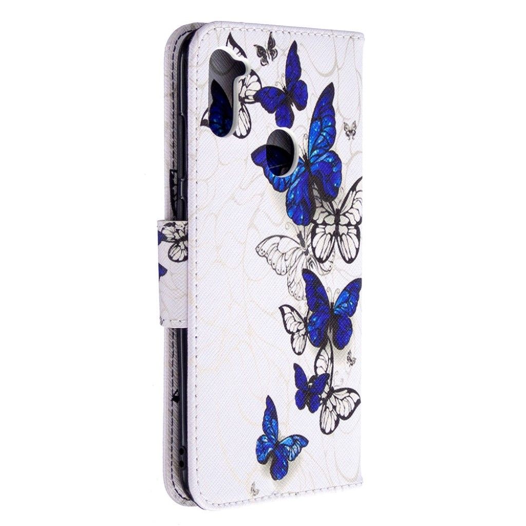 Wonderland Samsung Galaxy A11 / M11 flip case - Blue and White Butterflies