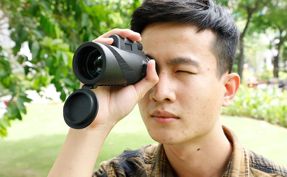 Man using Starscope monocular