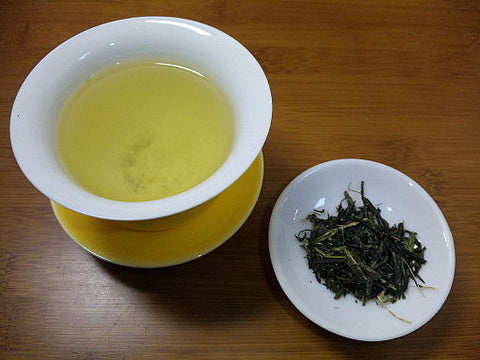 Kabuse green tea leaves and cup