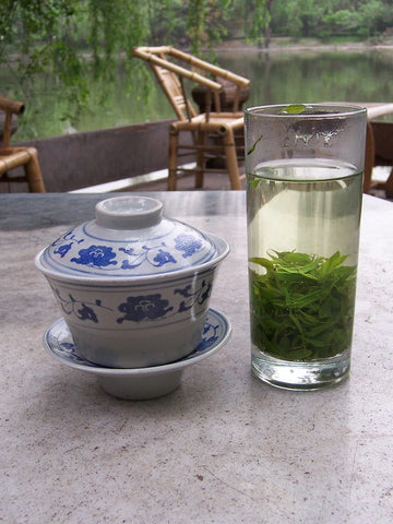 Green tea in glass and cup in Sichuan 