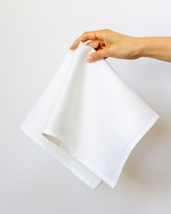 https://cdn.shopify.com/s/files/1/0583/2709/products/Napkin-Oyster-hand-4x5_600x.jpg?v=1601874380