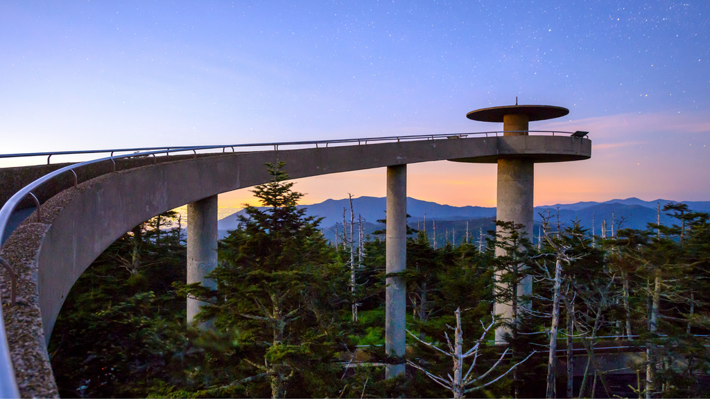 Twilight at the Clingmans Dome observation tower, a top destination among things to do in the Smoky Mountains, under a starry sky.