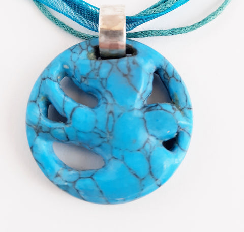 Blue howlite crystal hand carved necklace with sterling silver bale