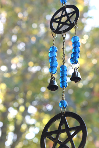 Three tiered bronze pentagram wind chime with blue beads and bells