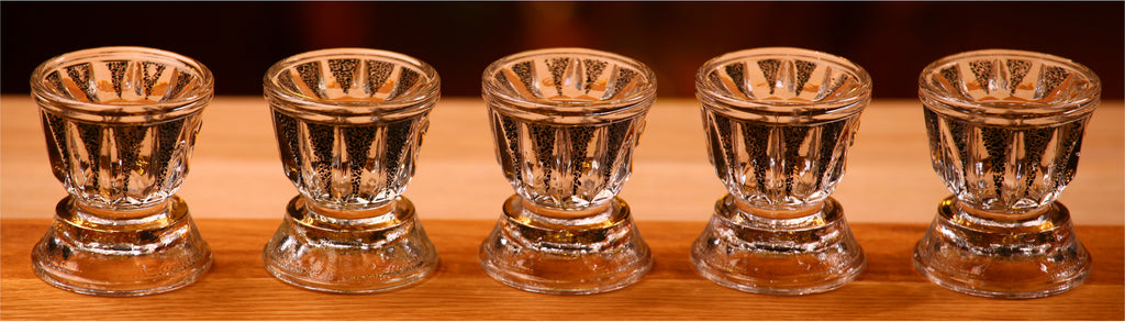 Vodkas lined up in glasses for tasting