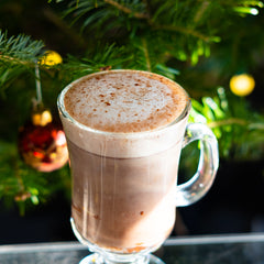 Highland Hot Chocolate in front of Christmas tree