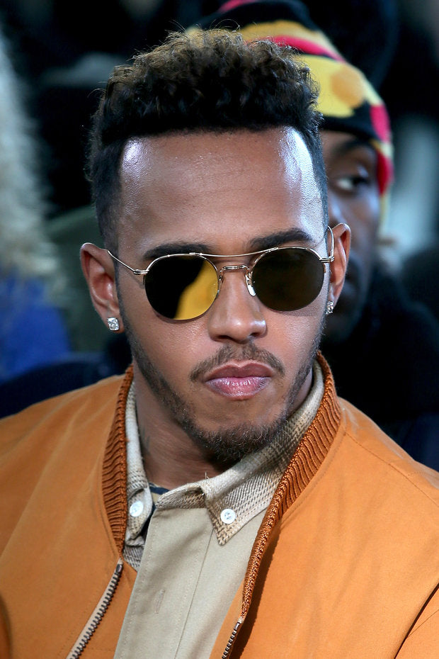 Lewis Hamilton Wears Louis Vuitton Souvenir Jacket and Sneakers at